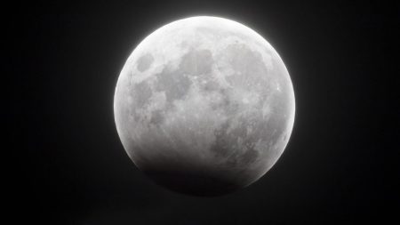 See The Dramatic ‘Hunter’s Moon Eclipse’ And Jupiter Light Up Night Sky